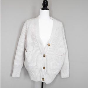 Zara knit cardigan with pockets and buttons.